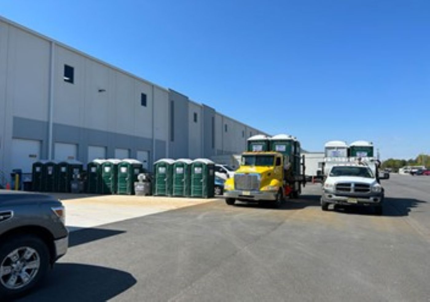 ADA restroom trailer rental set up at outdoor venue with access ramp in Burlington County, NJ